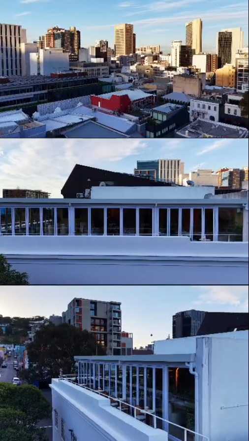 Panoramic Cape Town skyline at golden hour from the ONE40vue rooftop
