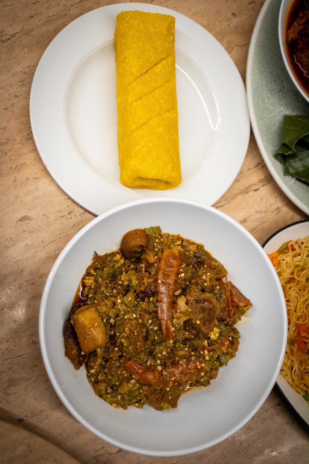 Okra and seafood stew with golden yellow dough at ONE40vue